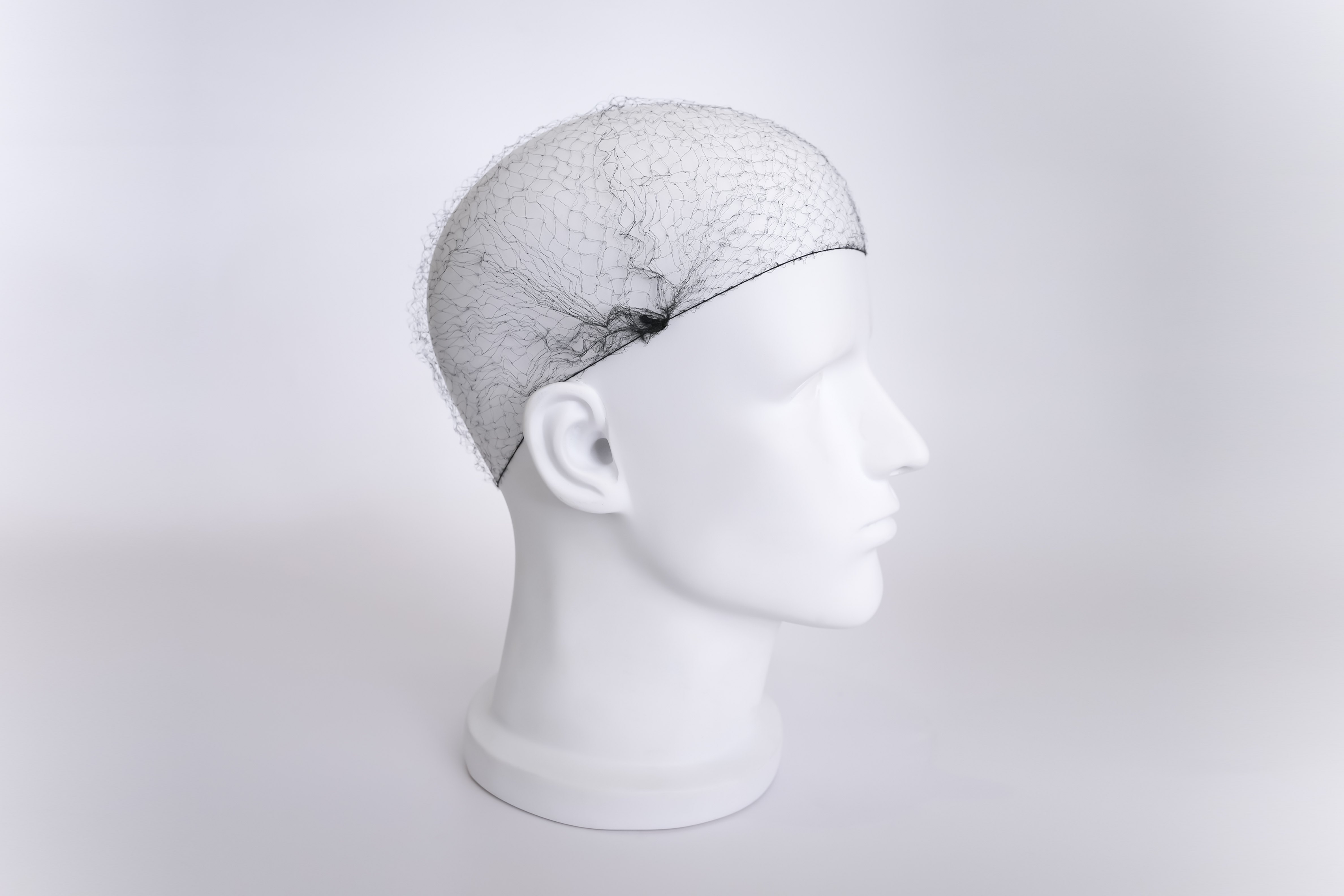 Latex-free elastic hairnets for food service, medical, and dance applications