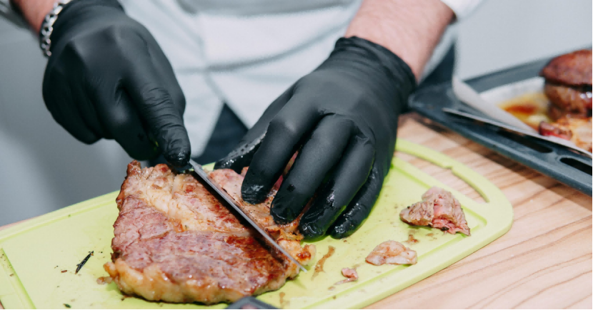 food handling by black nitrile gloves 
