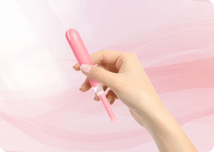 Woman Using Compact Click Tampon During Menstrual Care